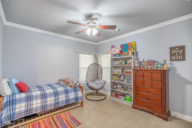 carpeted bedroom featuring crown molding and baseboards