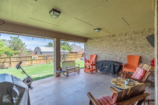 view of patio featuring grilling area and a fenced backyard