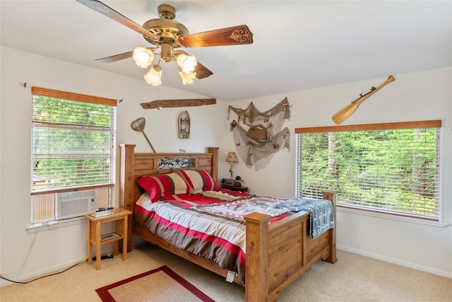bedroom featuring a ceiling fan, baseboards, carpet, and cooling unit