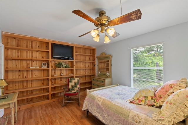 bedroom with wood finished floors