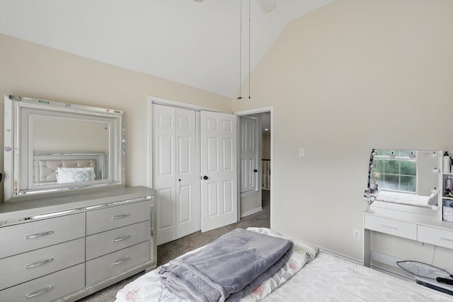 carpeted bedroom featuring high vaulted ceiling and a closet