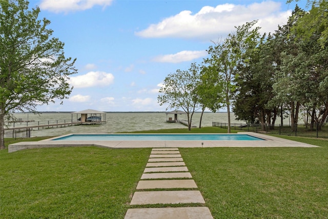 view of pool featuring a yard, fence, and a fenced in pool