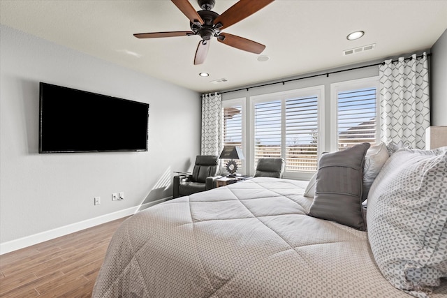 12225 Grosbeak Dr, Denton, TX 76207 - bedroom with visible vents, recessed lighting, baseboards, and wood finished floors