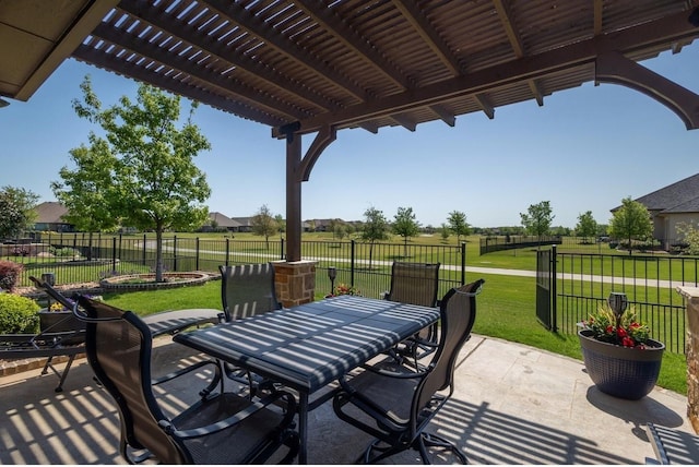 12225 Grosbeak Dr, Denton, TX 76207 - view of patio with outdoor dining area and fence