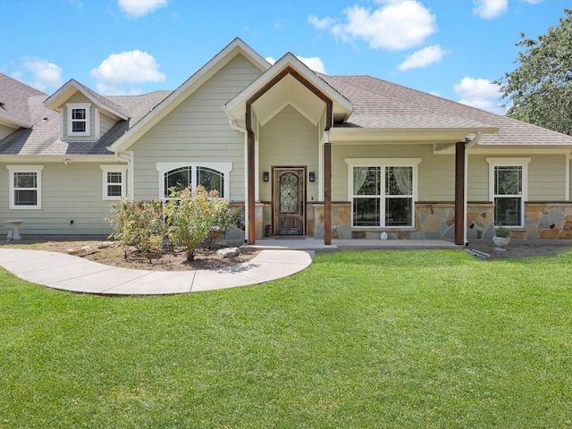 1255 Greg St, Azle, TX 76020 - view of front of house with roof with shingles, stone siding, and a front yard