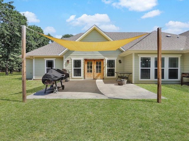 1255 Greg St, Azle, TX 76020 - back of property with a yard, a patio area, and roof with shingles