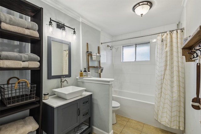 bathroom with tile patterned flooring, toilet, shower / tub combo, and vanity