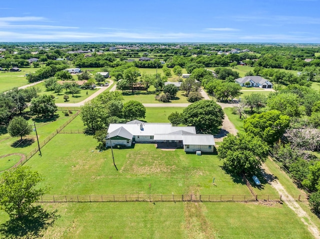 birds eye view of property with a rural view