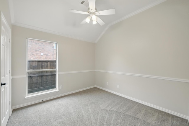 3512 Kales Ln, Flower Mound, TX 75022 - spare room featuring crown molding, carpet floors, lofted ceiling, baseboards, and ceiling fan