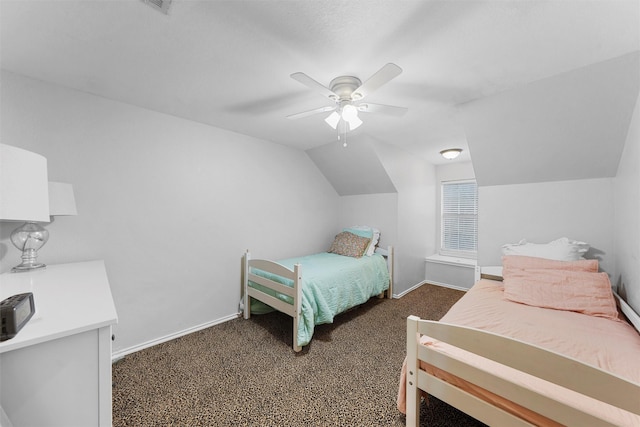 carpeted bedroom with baseboards, a ceiling fan, and lofted ceiling