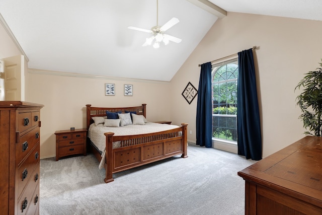 bedroom with ceiling fan, lofted ceiling with beams, and light colored carpet