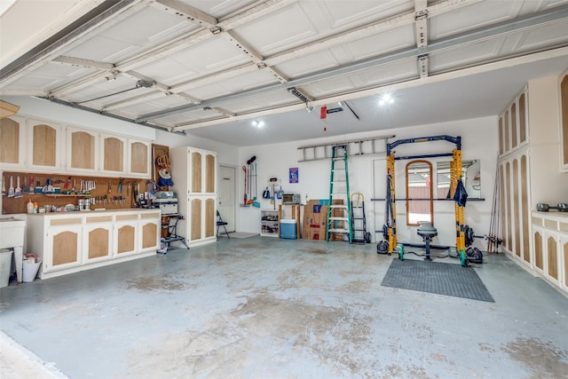 garage with a workshop area