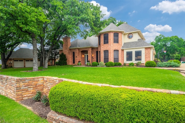 view of front facade featuring brick siding, a chimney, roof with shingles, and a front lawn