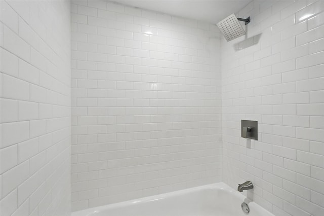 full bathroom with bathing tub / shower combination