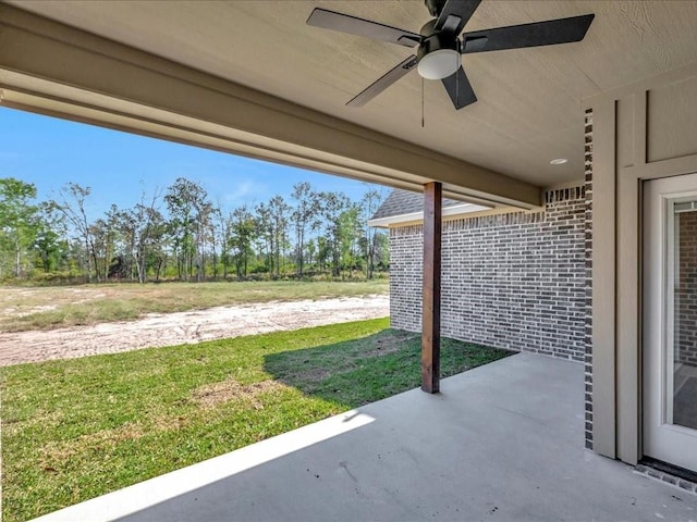 view of patio featuring a ceiling fan
