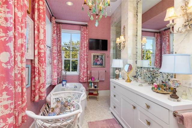 13230 Miller Rd, Azle, TX 76020 - full bathroom featuring vanity, a textured ceiling, a chandelier, tile patterned floors, and baseboards