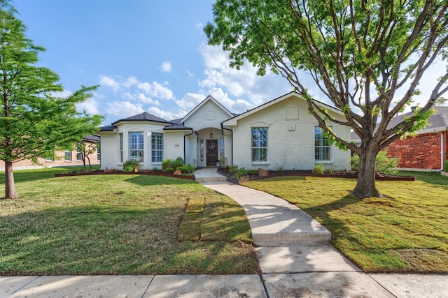 4045 Sun King Ln, Frisco, TX 75033 - single story home featuring brick siding and a front yard