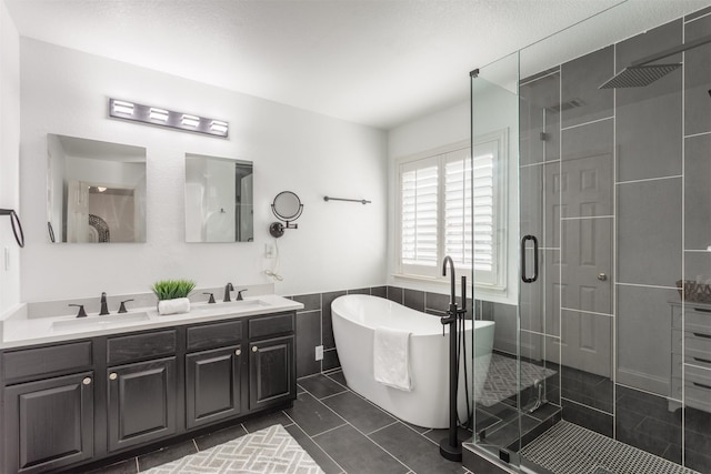4045 Sun King Ln, Frisco, TX 75033 - full bath with a sink, a shower stall, double vanity, and a freestanding bath