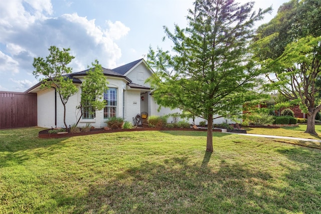 4045 Sun King Ln, Frisco, TX 75033 - single story home featuring brick siding, a front lawn, and fence
