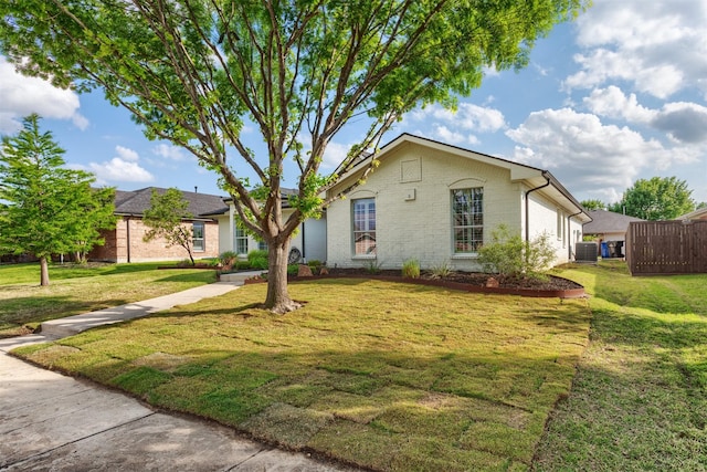 4045 Sun King Ln, Frisco, TX 75033 - ranch-style house with central air condition unit, a front lawn, and brick siding