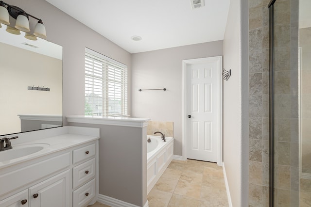 2231 Morning Dew Ct, Allen, TX 75013 - bathroom featuring vanity, a bath, and a tile shower