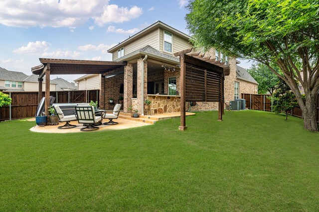 2231 Morning Dew Ct, Allen, TX 75013 - fenced backyard with a hot tub, a ceiling fan, a deck, and a patio area