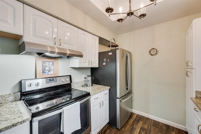 kitchen with appliances with stainless steel finishes, a chandelier, white cabinetry, dark wood-type flooring, and under cabinet range hood