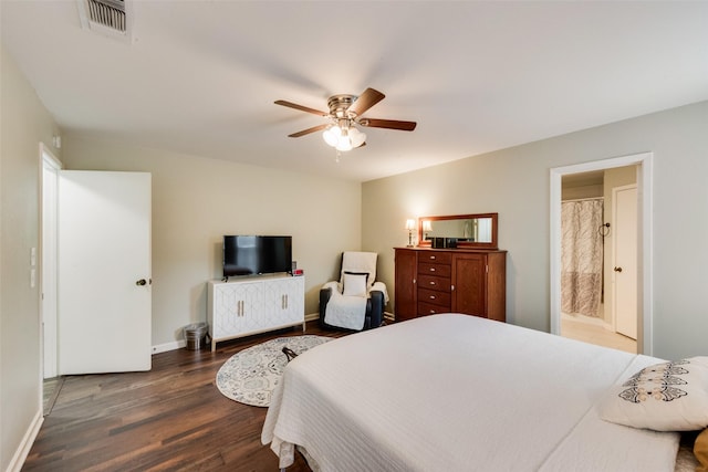 bedroom with baseboards, ceiling fan, dark wood-style floors, and visible vents