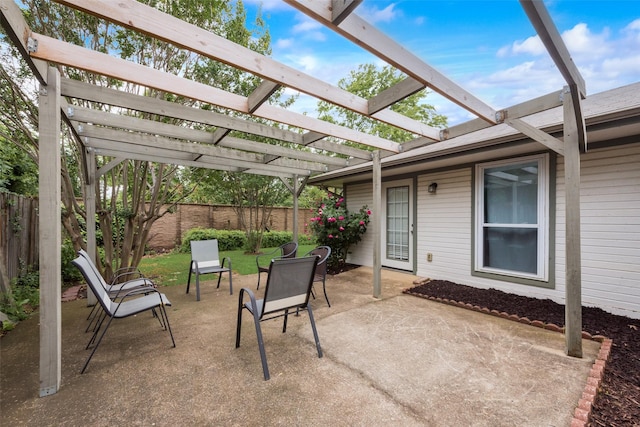 view of patio / terrace featuring a fenced backyard and a pergola