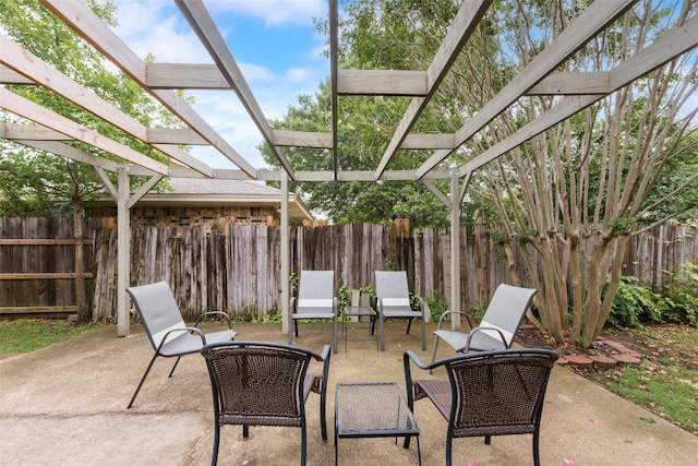 view of patio / terrace with a pergola and a fenced backyard