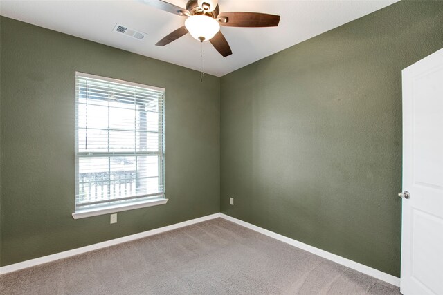 5608 Crestview Dr, Celina, TX 75009 - carpeted empty room with visible vents, a ceiling fan, baseboards, and plenty of natural light