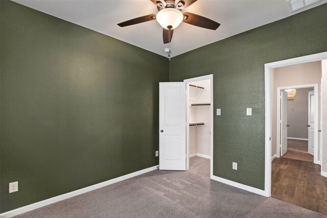 5608 Crestview Dr, Celina, TX 75009 - unfurnished bedroom featuring a textured wall, a walk in closet, baseboards, visible vents, and a closet