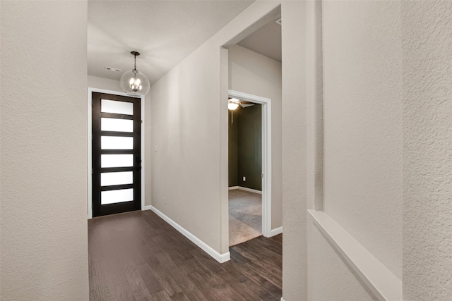 5608 Crestview Dr, Celina, TX 75009 - foyer with visible vents, a textured wall, baseboards, a chandelier, and dark wood finished floors