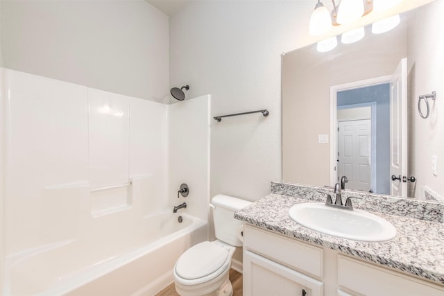 full bathroom featuring vanity, toilet, and shower / washtub combination