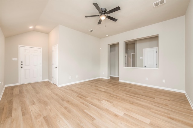 unfurnished living room with visible vents, a ceiling fan, light wood finished floors, and baseboards