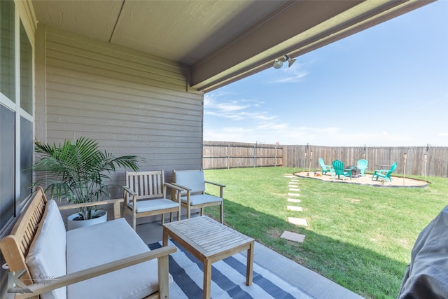 view of yard featuring a patio, outdoor lounge area, and a fenced backyard