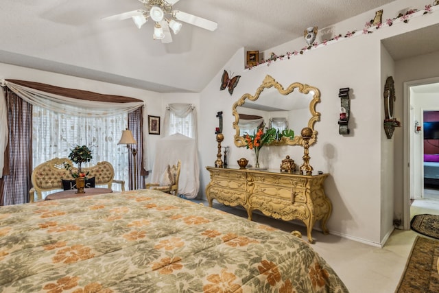 bedroom featuring carpet floors, ceiling fan, baseboards, and vaulted ceiling