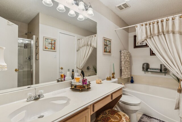 bathroom with visible vents, vanity, curtained shower, a washtub, and a textured ceiling