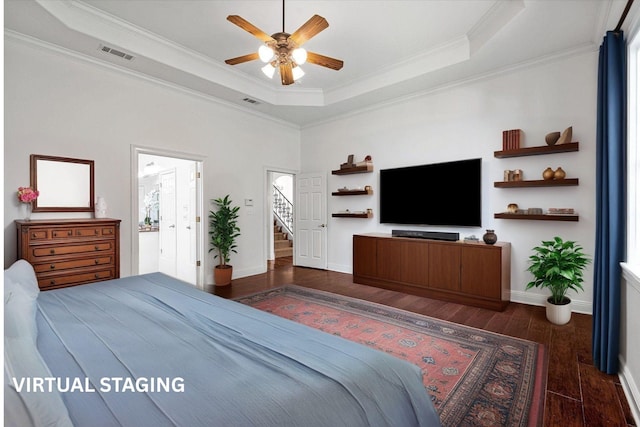 10535 Longfellow Trce, Shreveport, LA 71106 - bedroom with wood finished floors, ornamental molding, a tray ceiling, baseboards, and ceiling fan