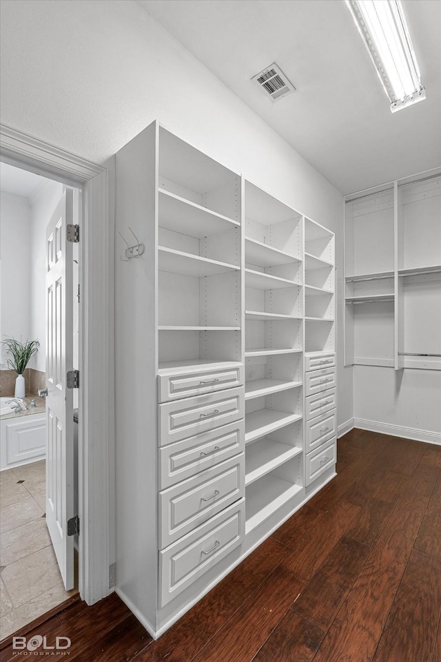 10535 Longfellow Trce, Shreveport, LA 71106 - spacious closet featuring wood finished floors