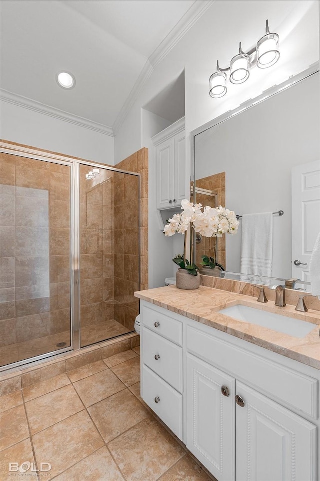 10535 Longfellow Trce, Shreveport, LA 71106 - full bathroom with ornamental molding, a stall shower, tile patterned floors, vanity, and toilet