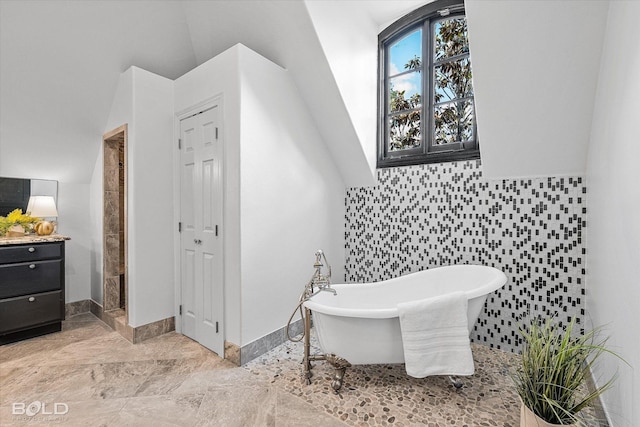 10535 Longfellow Trce, Shreveport, LA 71106 - bathroom with a freestanding tub, vanity, and a stall shower