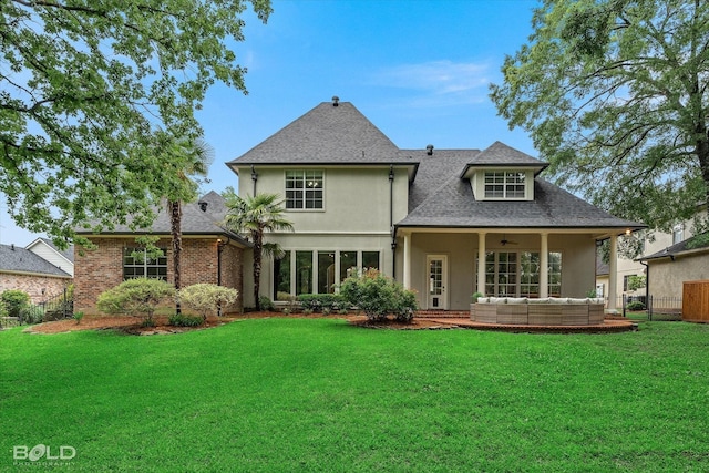 10535 Longfellow Trce, Shreveport, LA 71106 - back of house featuring ceiling fan, an outdoor living space, stucco siding, and a shingled roof