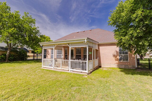 1503 S College Ave, Decatur, TX 76234 - rear view of house with brick siding, a shingled roof, and a patio