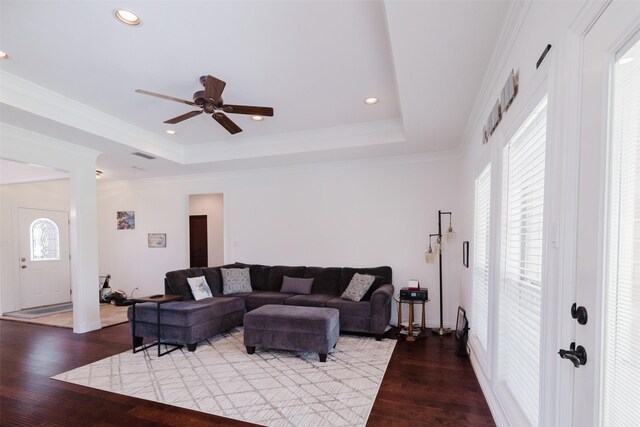 1503 S College Ave, Decatur, TX 76234 - living area with wood finished floors, a ceiling fan, a raised ceiling, baseboards, and crown molding
