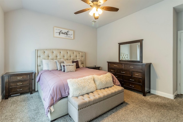 bedroom featuring light carpet, a ceiling fan, baseboards, lofted ceiling, and visible vents
