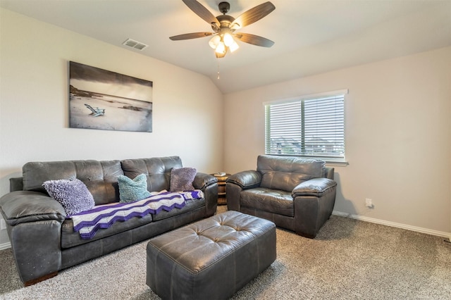living area featuring a ceiling fan, visible vents, baseboards, lofted ceiling, and carpet flooring