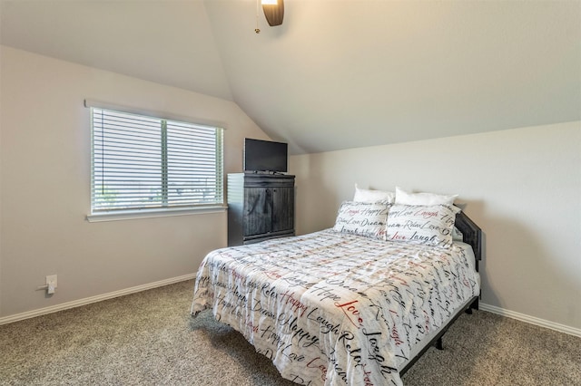 carpeted bedroom featuring baseboards, ceiling fan, and lofted ceiling