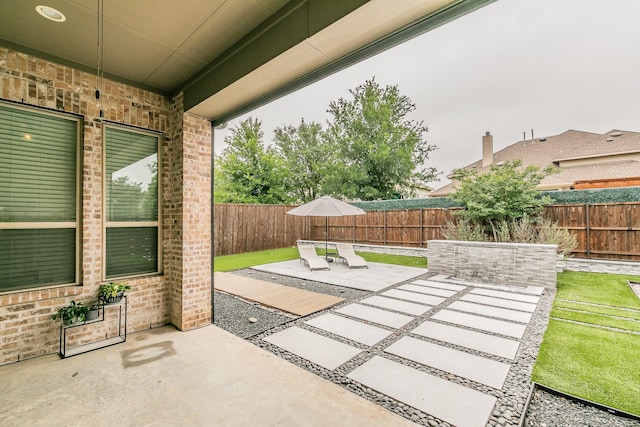view of patio featuring a fenced backyard
