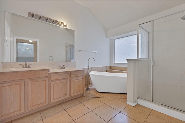 520 Jeff Grimes Blvd, Desoto, TX 75115 - full bathroom featuring tile patterned flooring, a sink, lofted ceiling, and a stall shower